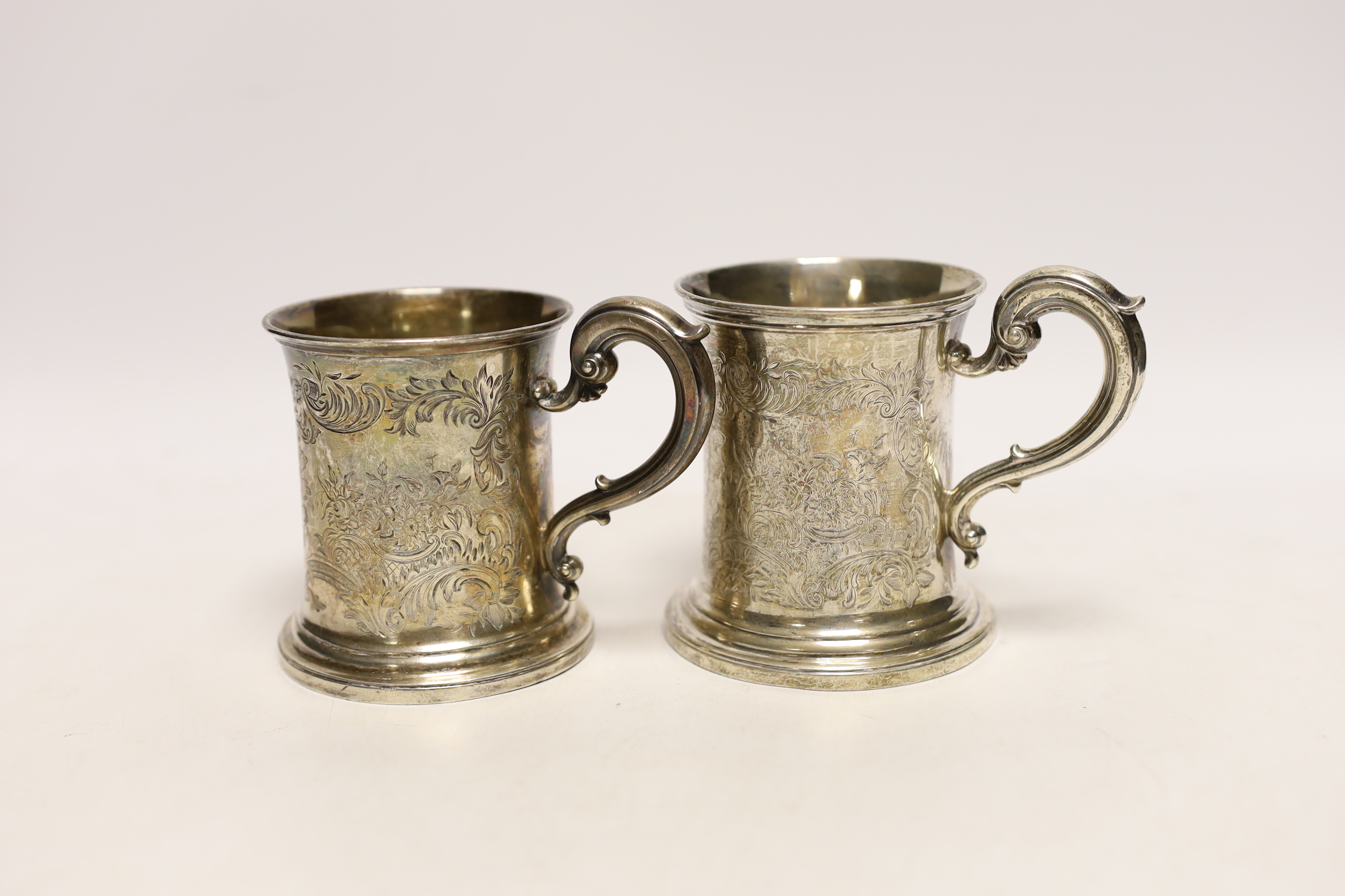 Two Victorian engraved silver christening mugs, the smallest by The Barnards, London, 1845, 86mm, 9.8oz.